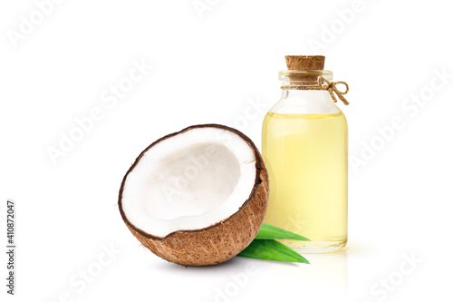 Coconut oil with coconut fruits cut in half isolated on white background.