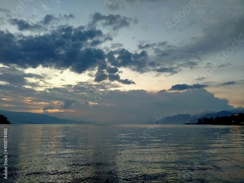 sunset in lake toba photo