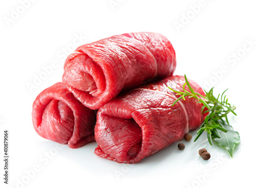 Schilderij op canvas Raw beef roulades isolated on white