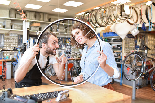 customer and dealer in bicycle shop - purchase and repair of bicycles - customer service