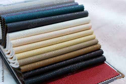 Catalog of multicolored imitation leather. Leatherette samples texture.