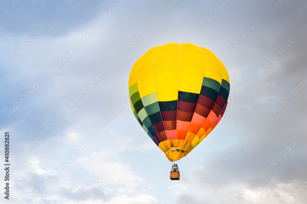 Fototapeta premium Hot air balloon over the blue sky over Igualada, Spain