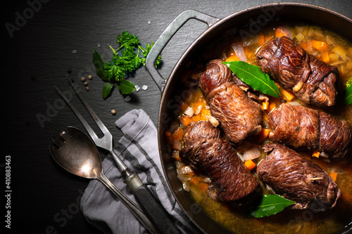Traditional german meal of beef roulades in roast pot photo