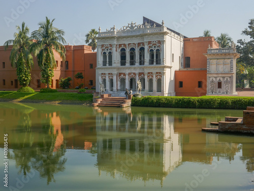 View with reflection in pond of beautiful ancient renovated mansion and museum Sardar Bari in Sonargaon, Bangladesh