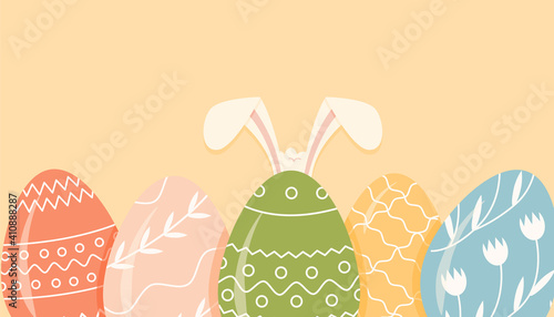 Festive banner template with decorated eggs on yellow background and bunny rabbit ears. Easter colored symbols with various ornament. Flat vector illustration for spring religious holiday celebration.