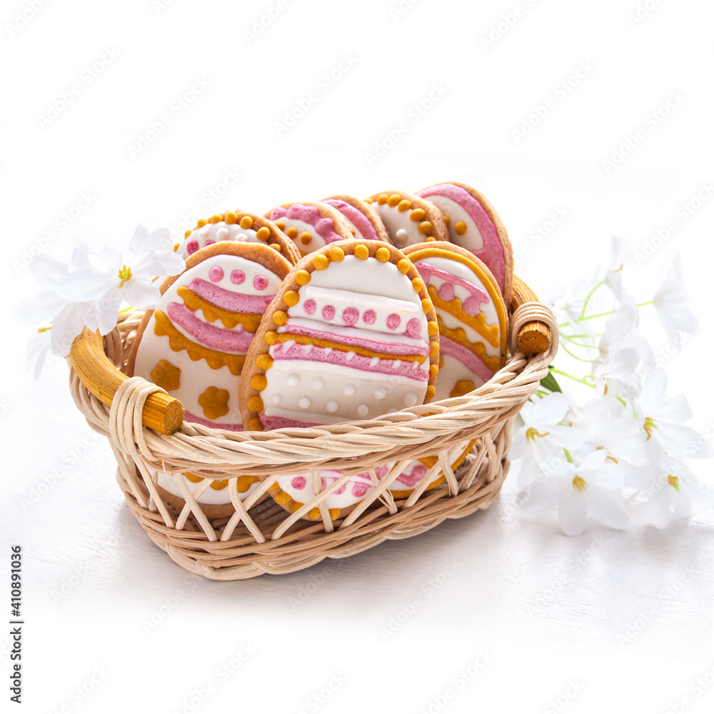 Colorful Easter cookies in the shape of egg on the white background