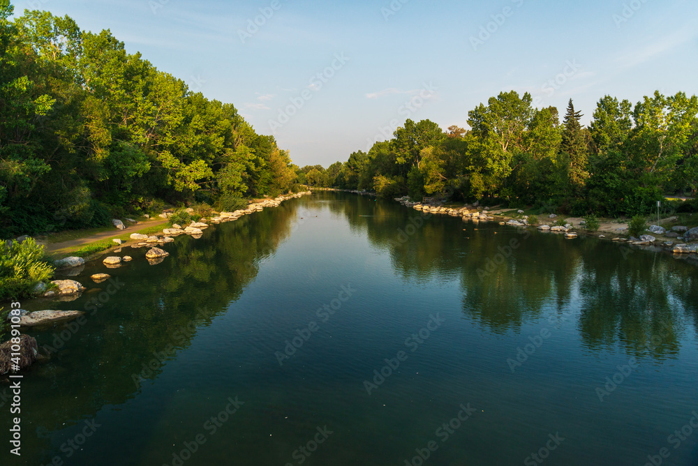 view of Bow river floing inside Calgary, Alberta, Canada view of Bow river floing inside Calgary, Alberta, Canada