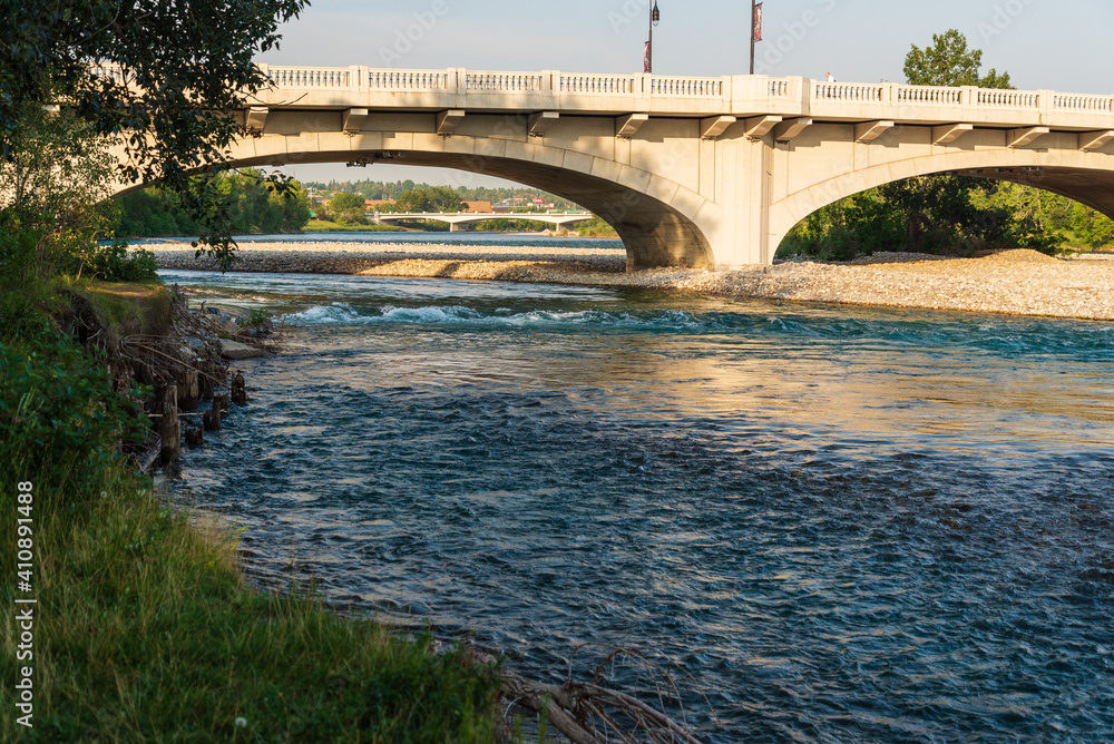 Fototapeta premium view of Bow river floing inside Calgary, Alberta, Canada