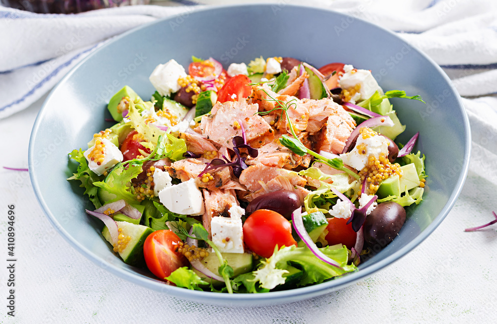 Ketogenic lunch. Greek salad with grilled salmon. Healthy dinner. Keto, paleo diet. Ketogenic lunch. Greek salad with grilled salmon. Healthy dinner. Keto, paleo diet.
