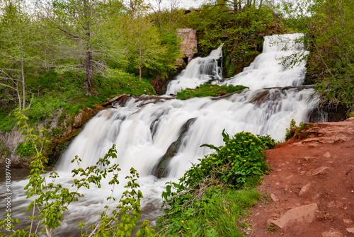 Waterfall on the river Dzhurin in Zaleschitsky district of Ternopil region of Ukraine. Dzhurinsky waterfall photo