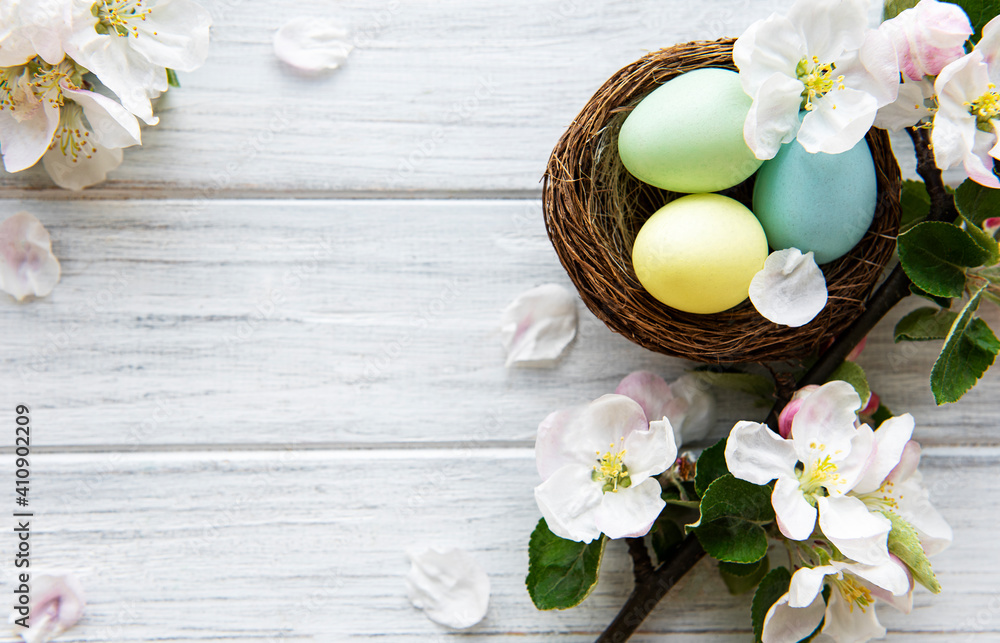Colorful Easter eggs with spring blossom flowers Colorful Easter eggs with spring blossom flowers
