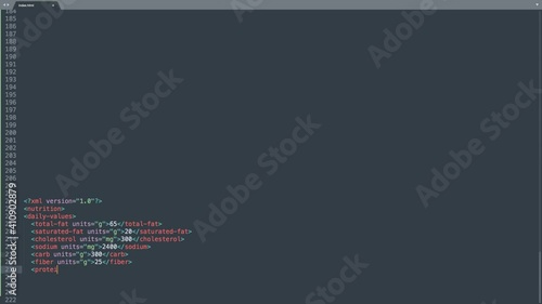 XML Extensible Markup Language Source Code Typing Effect. XML Ticker Colored Commands Editor Screen. Network Development Technology Education. Dark Blue Background.  photo