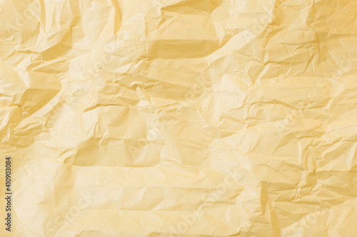 background from yellow crumpled paper