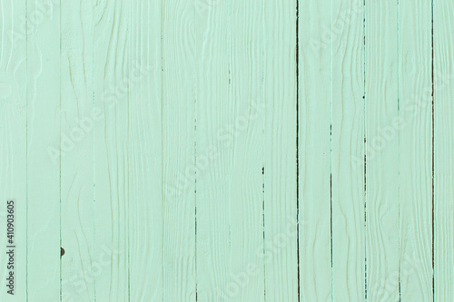 green painted wooden background
