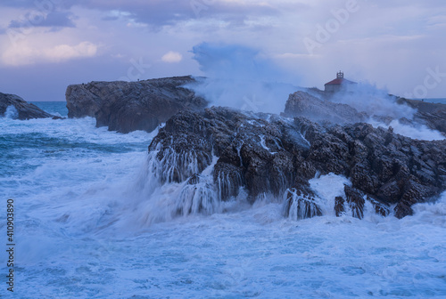 Swell and storm in the Hermitage of the Virgen del Mar San Roman de la Llanilla.Municipality of Santander. Virgen del Mar Island in the Cantabrian Sea. Autonomous Community of Cantabria. Spain. Europe photo