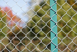 Selective focus shot of mesh fence