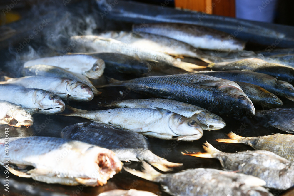 Barbecue with ocean fish at a culinary fair. Outdoor photography. Barbecue with ocean fish at a culinary fair. Outdoor photography.