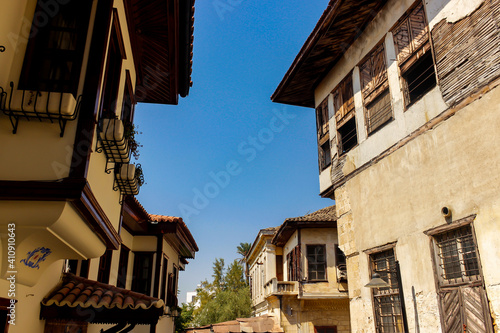Typical houses of Old Town, Antalya, Turkey. Restorated house vs. ruins of abondened old house. photo