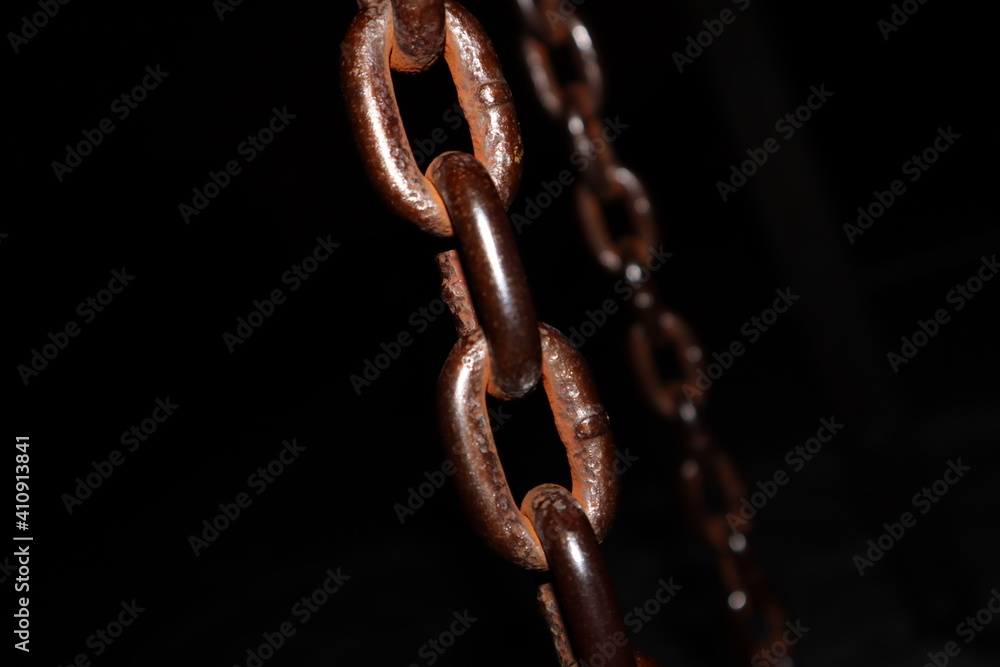 Rusty Chain on a Black Background Rusty Chain on a Black Background
