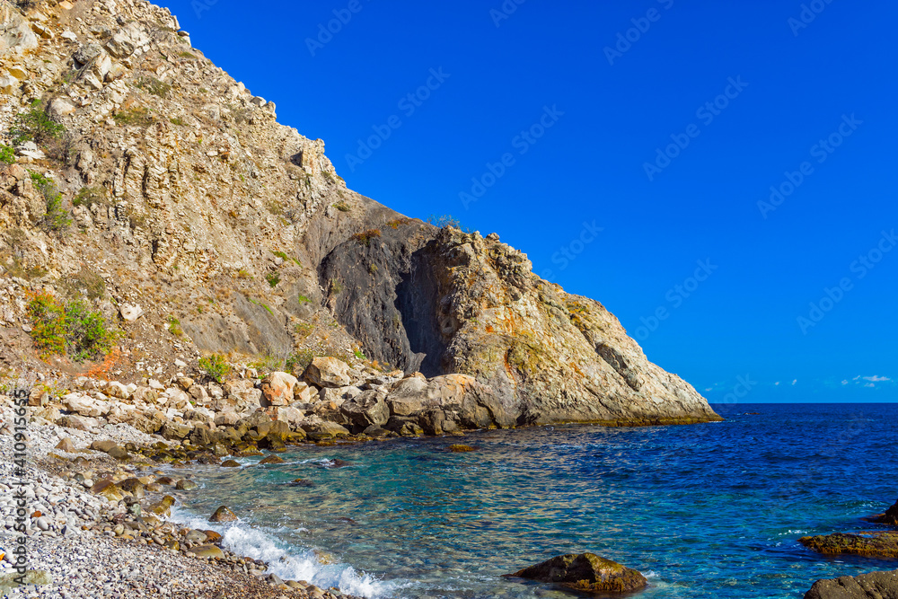 Fototapeta premium beautiful sea bay among the rocks on a sunny summer day