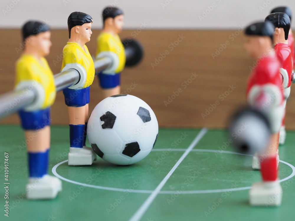 foosball game table plastic toy .sport in home concept foosball game table plastic toy .sport in home concept