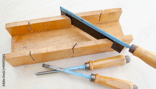 Old fashioned kids set mitre box and chisels for wood working 