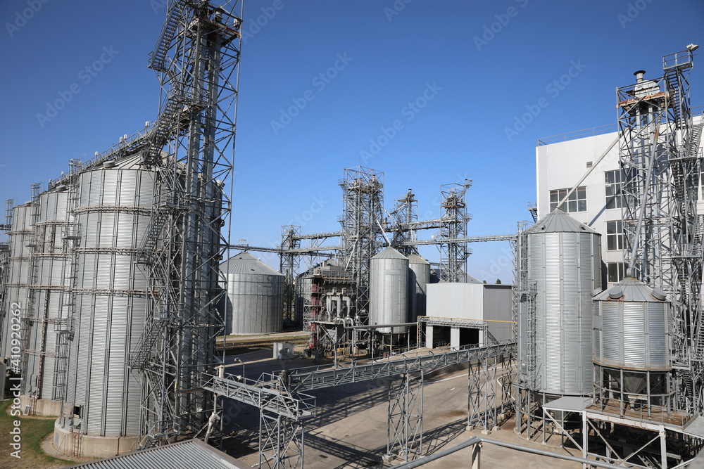 View of modern granaries for storing cereal grains outdoors View of modern granaries for storing cereal grains outdoors