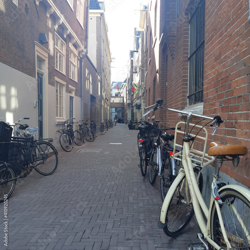 Amsterdam, Netherland. Bicycles stand near residential buildings.