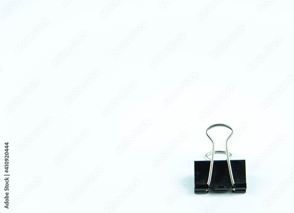 Paper clip on white background. Copy space for text.