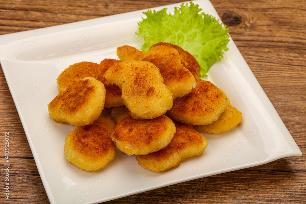 Fried chicken nuggets served salad leaves Fried chicken nuggets served salad leaves