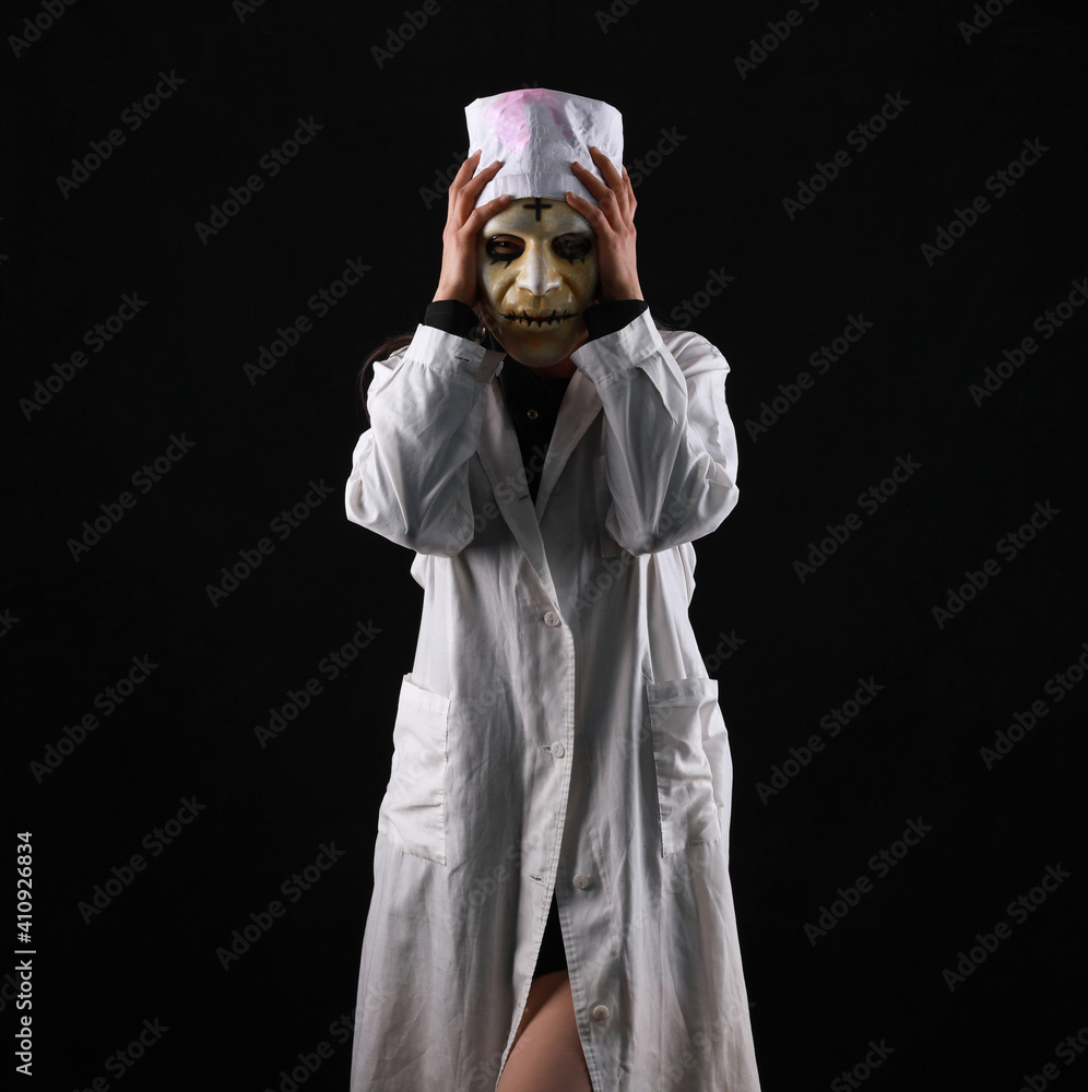 portrait of scary nurse on black background portrait of scary nurse on black background