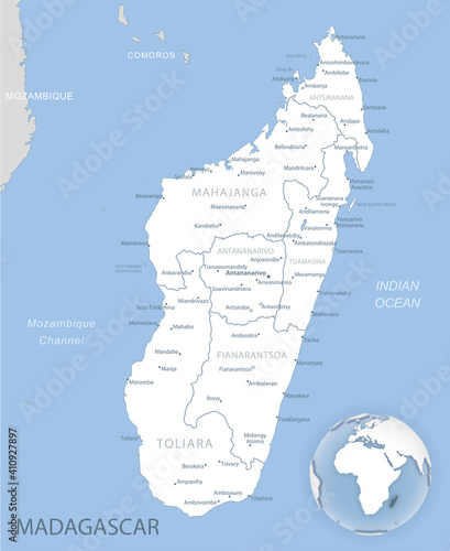 Blue-gray detailed map of Madagascar administrative divisions and location on the globe. Vector illustration