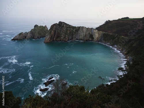 Panorama view of Playa del Silencio Gavieiro beach ocean sea coast shore cliffs in Castaneras Asturias Spain Europe photo