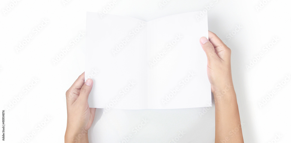 Hands holding paper blank for letter paper Hands holding paper blank for letter paper