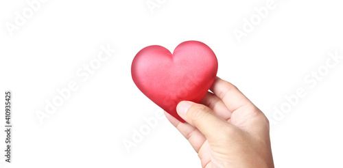 Hands holding red heart. heart health donation concepts