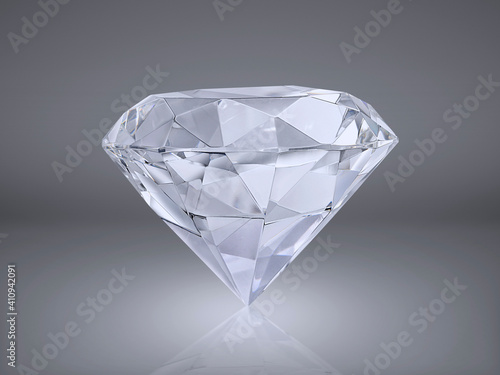 Shiny brilliant diamond placed on gray background