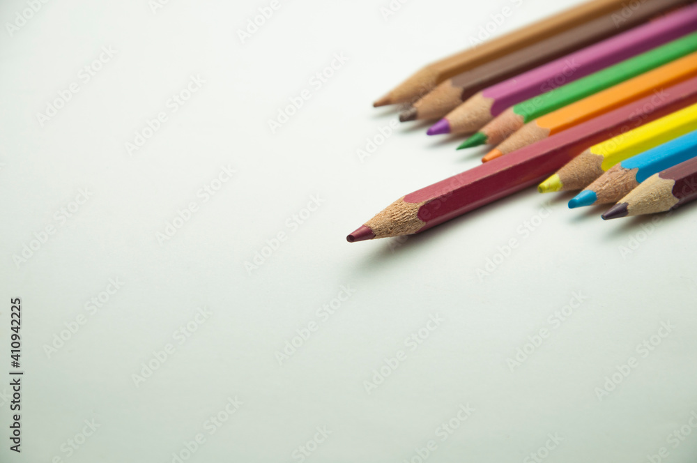 colored pencils on a white background. education concept. illustration of training. colored pencils on a white background. education concept. illustration of training.