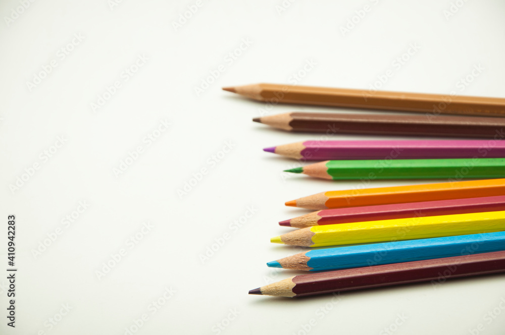 colored pencils on a white background. education concept. illustration of training. colored pencils on a white background. education concept. illustration of training.