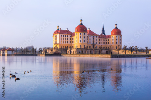 Moritzburg castle after sunrise at winter time, Germany