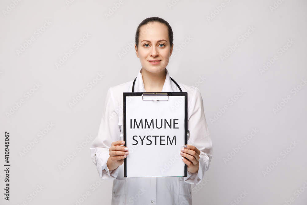 Doctor holding a card with text Immune system , medical concept. Doctor holding a card with text Immune system , medical concept.