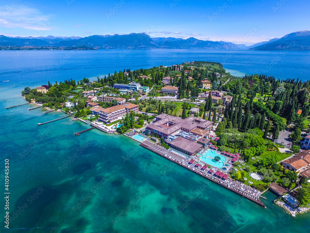 View by Drone - Aquaria in Sirmione, Garda Lake. spectacular view on lake, italian summer view aerial by Drone