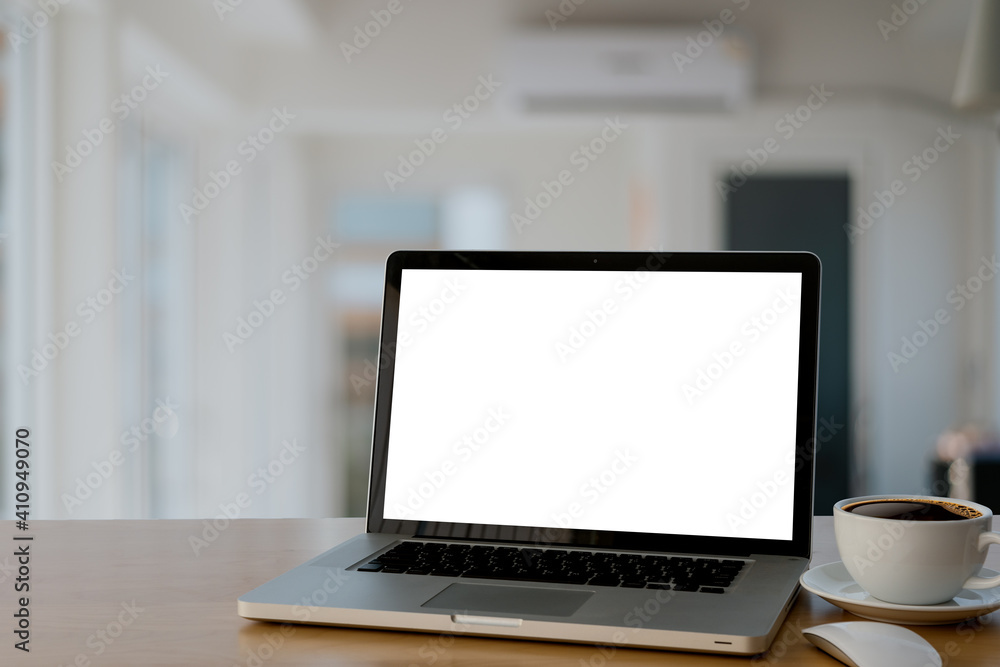 laptop and coffee cup on table. laptop and coffee cup on table.