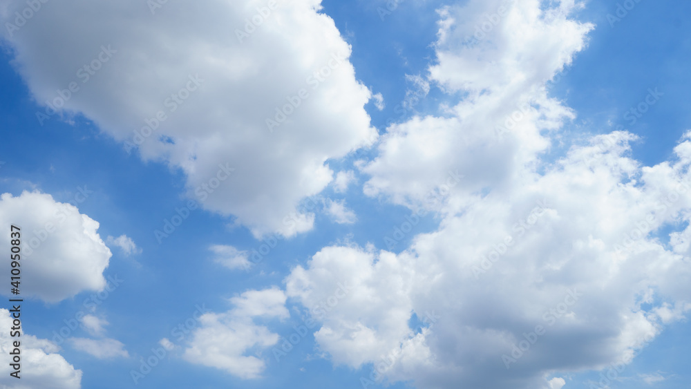 Summer sky is bright blue. There are clouds floating through. Feel relax when looking. See the sun on the sun. Summer sky is bright blue. There are clouds floating through. Feel relax when looking. See the sun on the sun.
