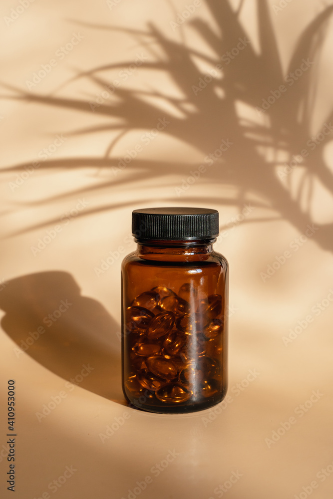 A jar of Omega 3 capsules for health. A jar of Omega 3 capsules for health.