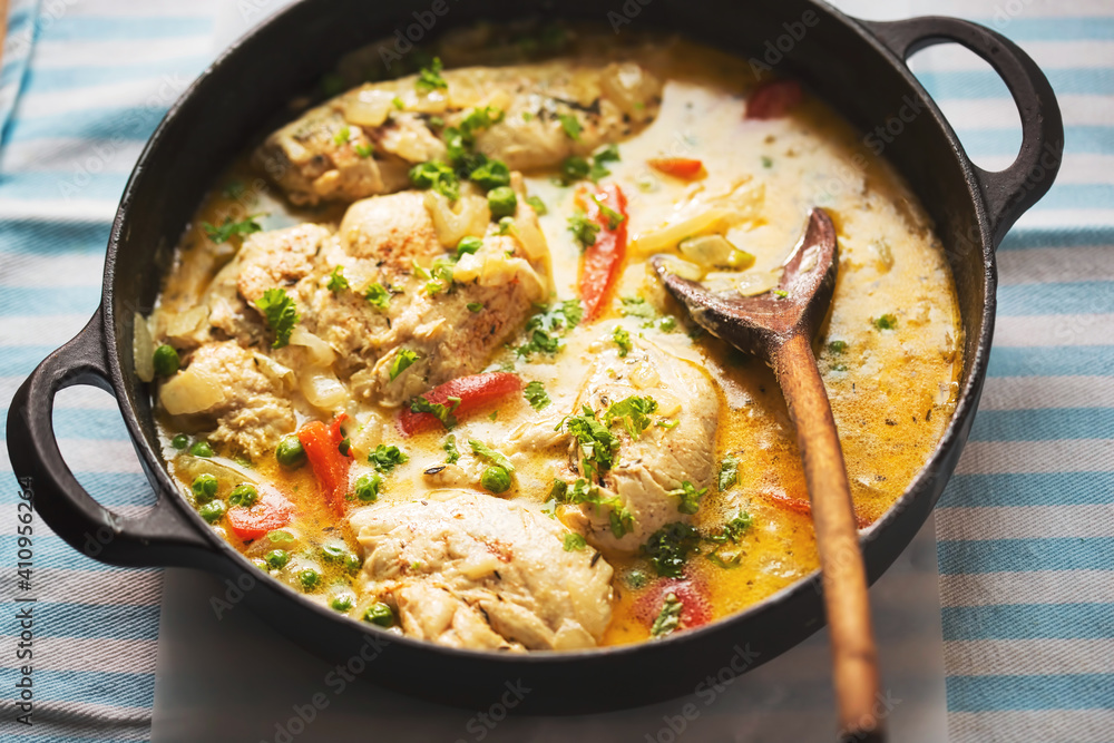 Chicken with peas and red pepper in cream sauce
Chicken with peas and red pepper in cream sauce
