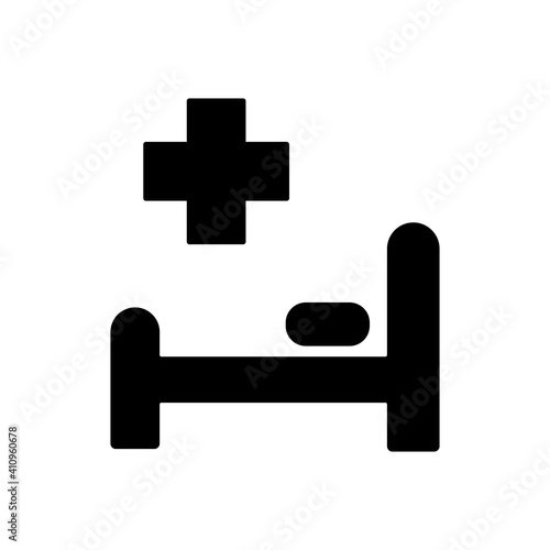 Hospital bed and cross glyph icon. Medical sign