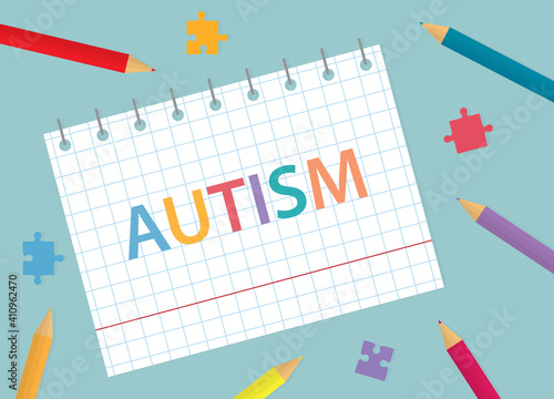 autism written in notebook with colorful pencils and puzzle pieces- vector illustration