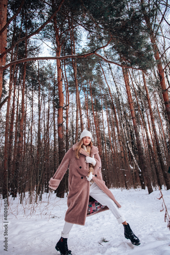 Girl in the winter in the forest Girl in the winter in the forest