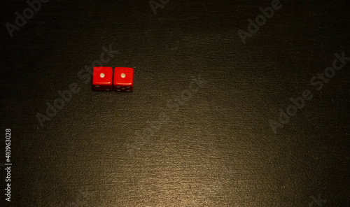 Dice combination on a black wooden surface