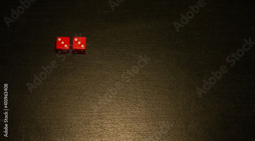 Dice combination on a black wooden surface